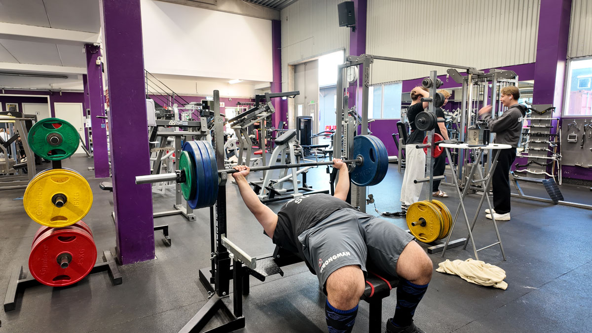 Coach is lifting weights